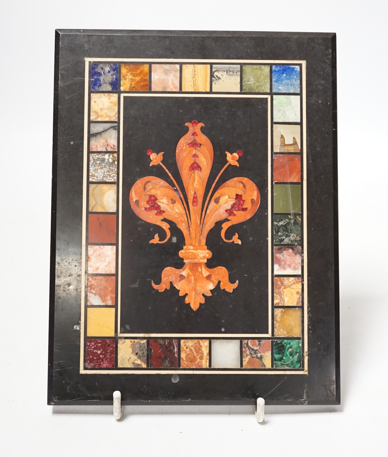 An Italian pietra dura ‘fleur de lys’ plaque, 20x15.5cm